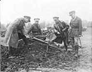 Canadian Motor Machine Gun Officers interested in captured German machine Gun. March, 1918 Mar., 1918.