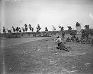 (General) 72nd Battalion man throwing the hammer. Canadian Highland Sports Meet. July 1918.