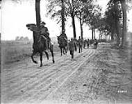 Canadian Cavalry bringing in prisoners. Battle of Amiens August, 1918.