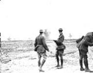Shell bursting near Canadian Officers during the Canadian advance. Advance East of Arras. September, 1918 September, 1918.