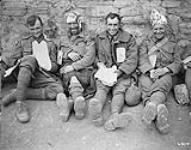 Four happy wounded Canadians at a C.C.S. Advance East of Arras. September, 1918 September 1918.