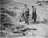 Sir Edward Kemp viewing German ammunition dump. Amiens. August, 1918 August 1918.