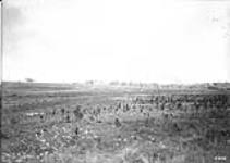 German incendiary shells bursting in village captured by Canadians. Advance East of Arras. September, 1918 September, 1918.