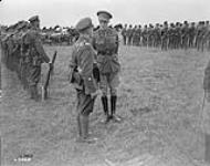 The Prince of Wales inspects a Canadian Machine Gun Battalion on the Valenciennes Front. October, 1918 Oct., 1918
