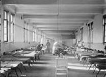 Ward scene of a Canadian Casualty Clearing Station in Valenciennes. Nov. 1918 Nov., 1918.