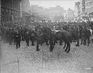 87th Battalion Band playing outside Hotel de Ville. November, 1918. [Valenciennes, France] Nov. 1918.