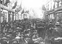 A scene in the streets of Namur, just after the cavalry preceding the Canadians entered the town Nov., 1918