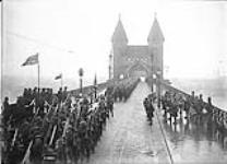 19th Canadian Infantry Battalion passing the Corps Commander on Bonn Bridge. December, 1918 Dec., 1918