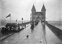 G.O.C. and H.Q. Staff, 2nd Canadian Division, passing the Saluting Base [on the Bridge over the Rhine at Bonn] December, 1918 Dec., 1918