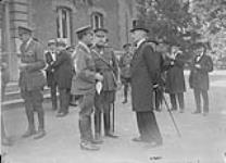 (Presentation of Cdn. Guns to the City of Mons.) Lt.-Col. W. Bovey, Lt-Gen. Clooten and Burgomaster Lescarts. - April & May 1919 April-May, 1919.