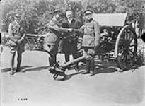 (Presentation of Cdn. Guns of to City of Mons.) Lt.-Gen. Clooten, Belgian Army, Burgomaster Lescarts, Lt-Col. W. Bovey, Major J.S. McAughey, April & May 1919 April-May, 1919.