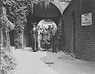 Sir R.L. Borden visiting the Maple Leaf Club in Elizabeth Street, London. Lady Drummond and Lady Perley (in uniform) were also present 1914-1919