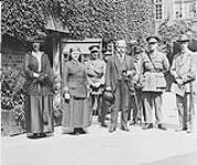Sir R.L. Borden visiting the Maple Leaf Club in Elizabeth Street, London. Lady Drummond and Lady Perley (in uniform) were also present 1914-1919