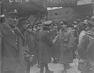 Departure of 3rd Canadian Division per S.S. "Adriatic" from Liverpool March 1st 1919. Maj-Gen Loomis has a kindly word and handshake for many officers and men as they passed March 1, 1919.