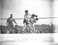 (Boxing) McGrath (Canada) VS Marrorati (Italy) in Bantam Weights. Inter-Allied Games, Pershing Stadium, Paris, July 1919 July, 1919.
