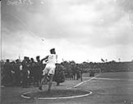 (Track & Field) McGillivray (Canada) casting the Discus. Inter-Allied Games, Pershing Stadium, Paris, July 1919 1919.