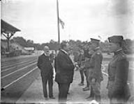 Americans receiving French honors. Lt.-Col. McDermott receives the Legion of Honor. Inter-Allied Games, Pershing Stadium, Paris, July 1919 1919.