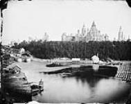 Parliament Buildings from Nepean Point showing entrance to Rideau Canal [between 1877-1880].