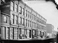Titus Block of Sparks St. between Bank & O'Connor St [before 1882].