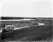 Looking west showing head gates and Bow River, (No.) 7 C.P.R. (Canadian Pacific Railway) 1868-1923