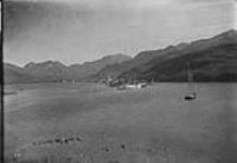 (Canada Alaska Boundary) Unalaska from east end across the bay, Str. "City of Bristol" at wharf. 1897