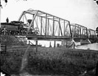 Bridge over Rideau River. [With locomotive Georgia crossing] Aug. 1882