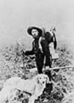 A prospector & companion ca. 1897-1910.