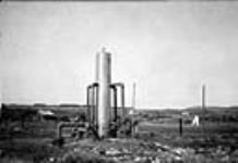 Naptha Condensor on pipeline from Royalite #4 (idle), Turner Valley, Alta 1926