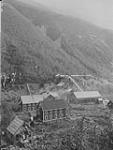 Slocan Mining Division, Sandon-Kaslo, B.C. Lucky Jim mine, looking south over bunk houses towards the workings, View from C.P.R. (Canadian Pacific Railway) track Sept. 1928