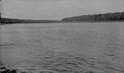 View looking North down Mattagami river at foot of island opposite G.R.P. Co. Ltd. camp - 8 miles North of Smoky Falls, Ont July 1935