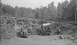 Ilmenite quarry, J. Coulombe, St. Urbain, Que Sept. 1940