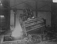 Joliette Steel Ltd., Pouring lava, Joliette, P.Q 1930