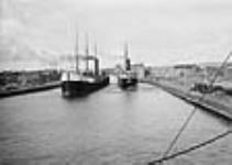S.S. CITY OF PARIS and SS ARABIAN in the locks of the Soo ca. 1897