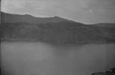 Battle Bluff, Kamloops Lake. The C.N.P. Ry. tunnel goes through this rock. 20-19-6 1920