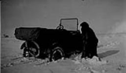 Stuck in the snow, Tp. 38-1-W2 [about 9 mi. N. of Swan Plain, Sask. 1920.]
