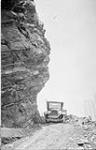 Difficult [road] construction along Gaspe coast, Que., 1927