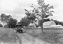 Car on the road longing Victoria Farm Fox Ranch 1914