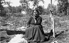 First Nations woman smoking a pipe 1900-1910.