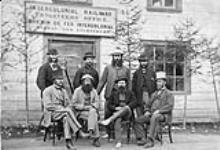 Group of engineers ouside Intercolonial Railway Engineers Office/Chemin de fer Intercolonial. Groupe d'ingenieurs a l'exterieur du bureau des ingenieurs ca.1869