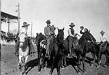 (Prince of Wales' visit to Canada) H.R.H. rode the length of the course at the stampede at Saskatoon, Sask., Sept. 11th n.d.