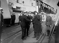 (Prince of Wales' visit to Canada) The Duke of Devonshire bids H.R.H. good-bye on H.M.S. "Renown" at Halifax, N.S. Nov. 25 n.d.