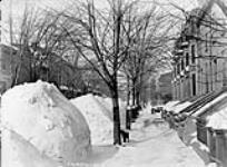 St. Famille Street in winter 1 Mar. 1887
