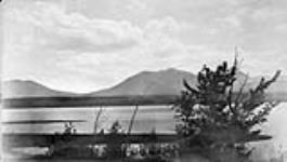 Canadian Pacific Railway Survey. Frypan Pass in distance/Levés du Canadien Pacifique. À partir de Takla Landing. Vue sur le lac. Col. Frypan au loin Sept. 1879