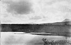 Canadian Pacific Railway Survey. From T.G.`s Lake Hogem Pass to right of Central Hill, vicinity of Lake Takla/Levés du Canadien Pacifique. Comme au no. 19 à partir du lac T.G. direction nord. Col "Hogem" à la droite de la colline centrale Sept. 1879