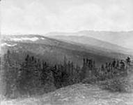 Canadian Pacific Railway Survey. From Atna Pass looking south-east, Babine Valley on right, Babine River area/Levés due Canadien Pacifique. Du col Atna, direction sud-est. Vallée Babine à droite 6 July 1879