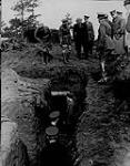 Sir Robert Borden inspecting a trench, [Branshott, England, April, 1917] [graphic material] [April, 1917].