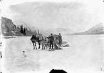 Moving Camp, sleigh on Windy Arm, Y.T., B.C., Yukon Boundary