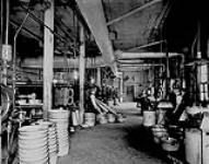 Interior view of Finishing Press Room showing cutting machines on right. British Explosives Co. Ltd., Renfrew, Ont c. 1914-1918
