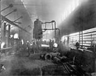 Forging 9'2" shells. Dominion Foundries & Steel Ltd., Hamilton, Ont [1914-1918]