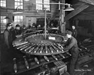 Attaching Fuse to Shell. The Energite Explosives Co. Ltd., Renfrew, Ont [Mar., 1916 - Nov. 1917]